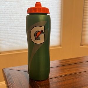 Green Gatorade Water Bottle with Orange Cap